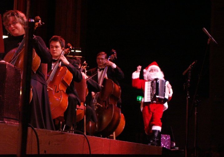 Santa plays with symphony